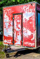 old trailer at a parking lot