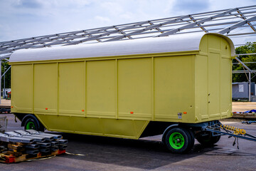 old trailer at a parking lot