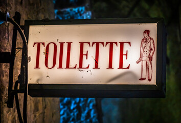 typical restroom sign in germany