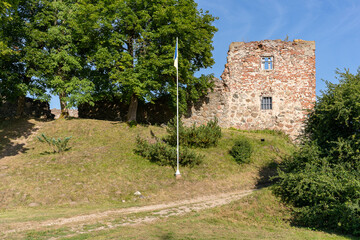 Fototapeta na wymiar Aizpute castle ruins in sunny day
