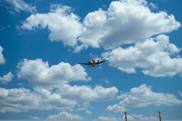 Airplane seen from the ground. Air transportation. Sky
