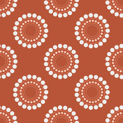 Circle dots repeat pattern sienna background with beige, peach coral and rust colors.