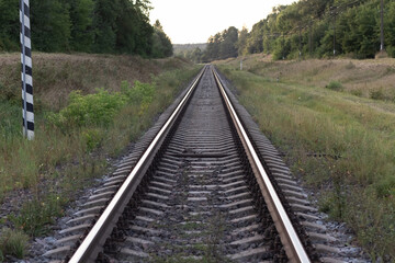 Fototapeta na wymiar Railway lines Lining of railway tracks, rails and crushed stone. Railway junction. Heavy industry. Railway track