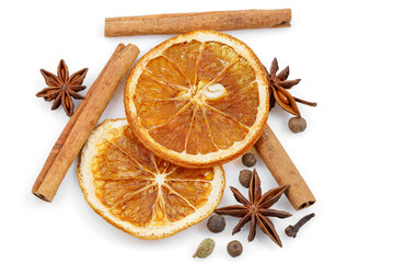 Spices for winter dishes, isolated on white background. Mulled wine or ingredients for seasonal...