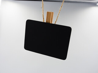 hanging blackboard with brown yarn isolated