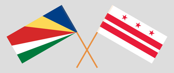 Crossed flags of Seychelles and the District of Columbia. Official colors. Correct proportion