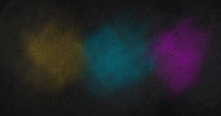 Abstract pattern of small splashes, sequins, spray. Yellow, purple and blue on a black background.