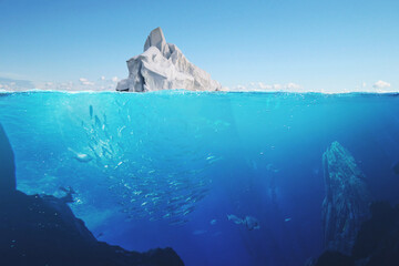 Amazing underwater world with wildlife in the ocean. Beautiful iceberg in the sea, a view underwater. Concept of global warming. Save the planet, a creative idea