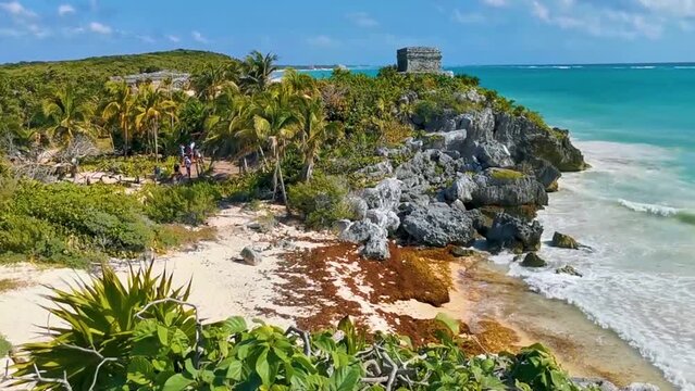 Ancient Tulum ruins Mayan site temple pyramids artifacts seascape Mexico.