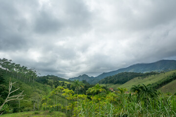 Obraz premium Landscape of a valley and mountains at the town of Macuco, State of Rio de Janeiro, Brazil.