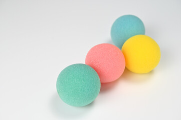 Fototapeta na wymiar Line up 4 colored sponge balls