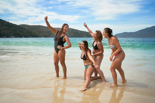 Group of friends taking a creative selfie