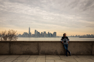 Teen boy in front of New York cityscape