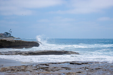 Waves crashing on rocks