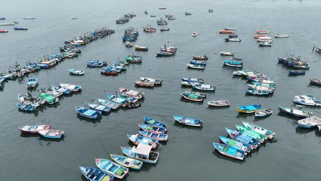 Paracas Port in Peru with the boats and city.