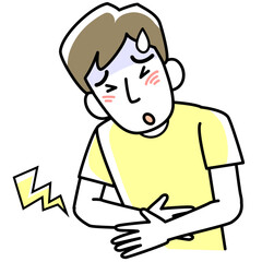 腹痛で困っている若い男性の上半身
