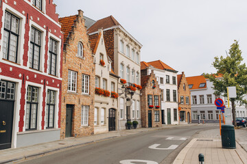 Street scene with colorful medieval buildings in Bruges, Belgium