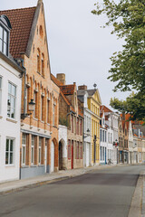 Fototapeta na wymiar Street scene with colorful medieval buildings in Bruges, Belgium