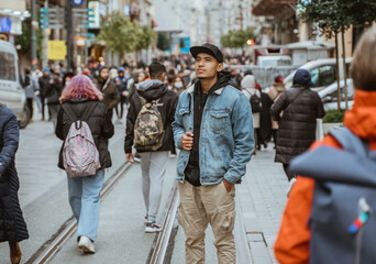male portrait while walking in pedestrian shopping centre in istanbul turkey
