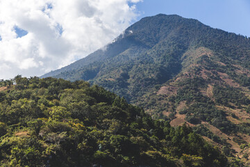 Fototapeta na wymiar Jungle mountains of Lake Atitlan, Guatemala in winter, Panajachel, San Marcos, Santiago Atitlan