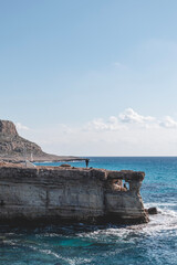 Beautiful sea caves with cape Greco on background in national park
