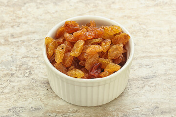 Sweet yellow raisin in the bowl
