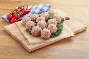 Raw pork meatball for cooking