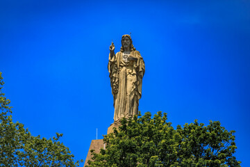 Fototapeta premium Sagrado Corazon Sacred Heart statue of Jesus Christ at the Mota Castle or Castillo de la Mota on Monte Urgull in San Sebastian, Basque Country, Spain