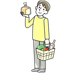 スーパーマーケットで買い物をする若い男性