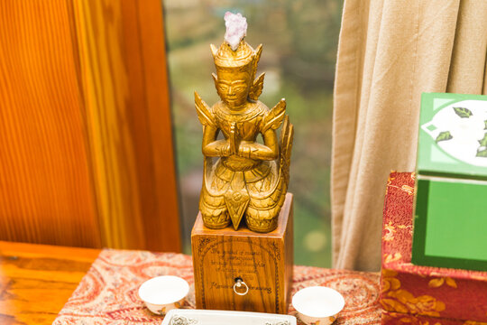 Buddhist figurine music box
