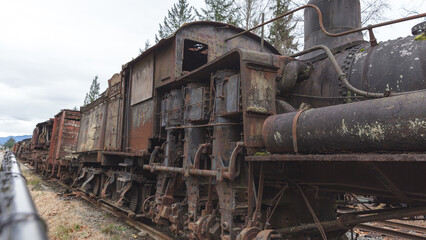 Fototapeta na wymiar Rusty old steam engine train
