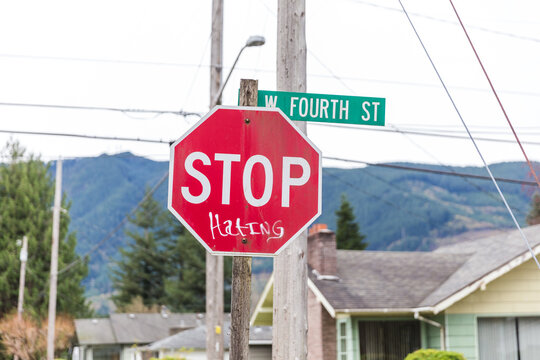 Stop sign vandalized to say "Stop Hating" in Ralroad Avenue Southeast in Snoqualmie, Washington