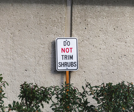 Do not trim shrubs sign