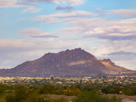 Southwest mountain landscape with homes in foreground, Arizona land, Phoenix or Scottsdale viewpoint