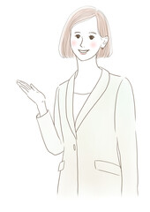 案内ポーズをするスーツ姿の女性