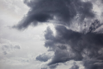 Fluffy gray cloudy sky