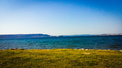 landscape with lake and blue sky