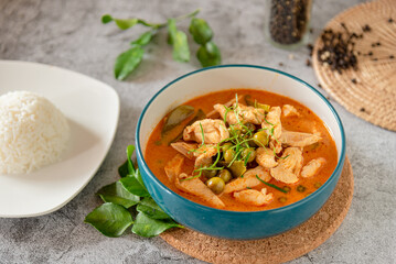 Thai red curry soup with chicken, served with streamed jasmine rice, Thai tradition food 
