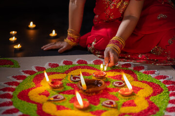 Traditional diya lamps lit during diwali celebration