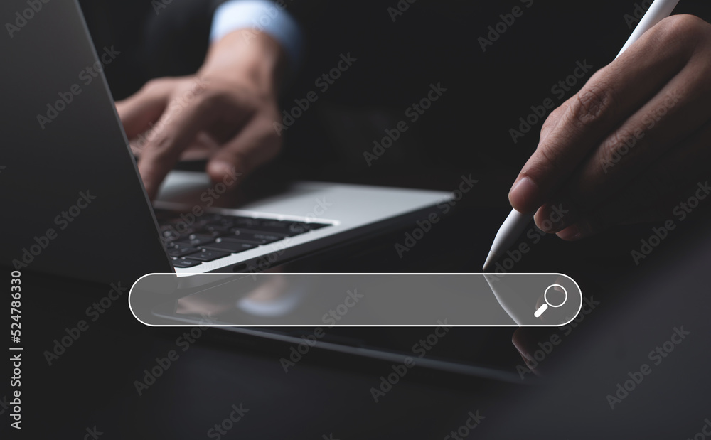 Wall mural data search technology, search engine optimization seo. businessman using digital tablet and laptop 