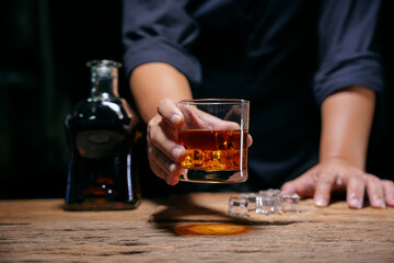 Barman pouring whiskey whiskey glass beautiful night