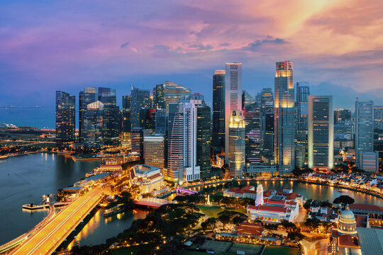 Singapore cityscape at dusk. Landscape of Singapore business building around Marina bay. Modern high building in business district area at twilight.