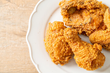 fried chicken with ketchup on plate