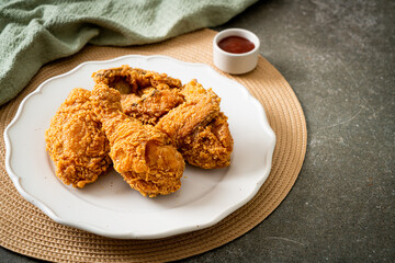 fried chicken with ketchup on plate