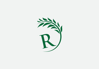 Green leaf and laurel wreath logo design vector with the letter and alphabet R