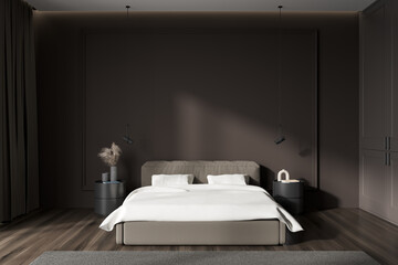 Front view on dark bedroom interior with empty brown wall