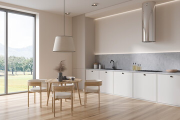 Light kitchen interior with seats and eating table, panoramic window