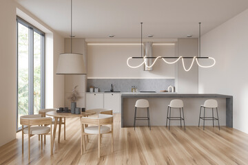 White kitchen interior with bar countertop and dining table, panoramic window