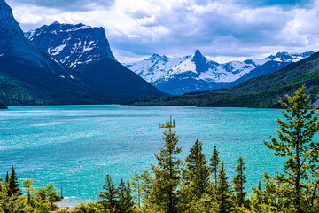 Naklejka na ściany i meble Mountains surround St Mary Lake in Glacier National Park