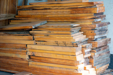 Eucalyptus Wood Plank With Blur Background. Wood Planks Are Stored For Making Wooden Furniture. Selective Focus, Copy Space.